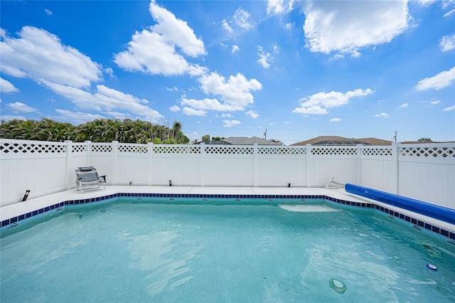 279 Mark Twain Ln, Rotonda West, FL 33947 - view of pool with a fenced backyard