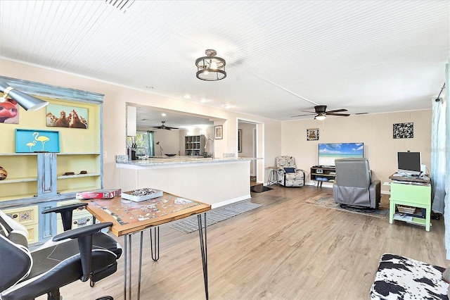 305 E Wentworth Cir, Englewood, FL 34223 - living area with ceiling fan and wood finished floors