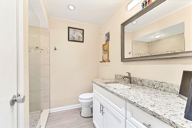 305 E Wentworth Cir, Englewood, FL 34223 - bathroom with walk in shower, ornamental molding, vanity, toilet, and baseboards