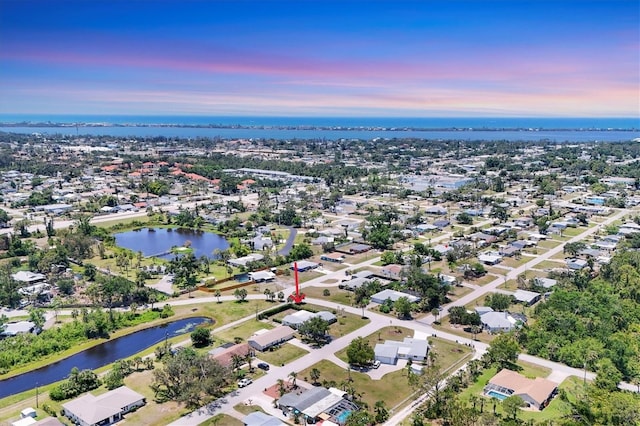 305 E Wentworth Cir, Englewood, FL 34223 - aerial view at dusk of a water view