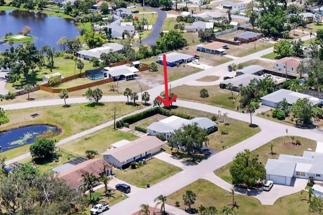 305 E Wentworth Cir, Englewood, FL 34223 - aerial view of residential area featuring a nearby body of water