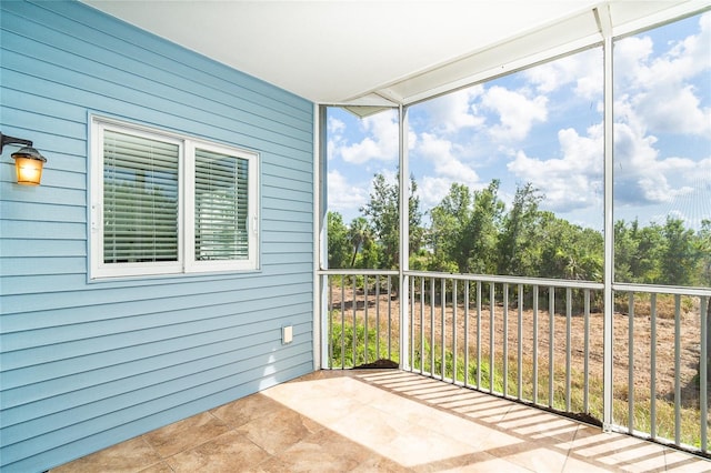 3929 Cape Haze Dr Unit 101, Rotonda West, FL 33947 - unfurnished sunroom with plenty of natural light