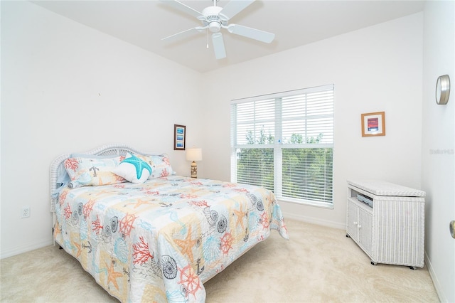 3929 Cape Haze Dr Unit 101, Rotonda West, FL 33947 - bedroom featuring light colored carpet, baseboards, and a ceiling fan
