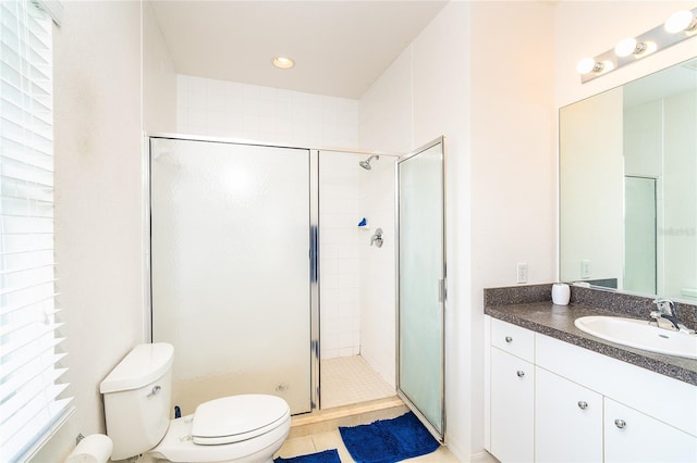 3929 Cape Haze Dr Unit 101, Rotonda West, FL 33947 - full bath with toilet, vanity, a shower stall, and recessed lighting
