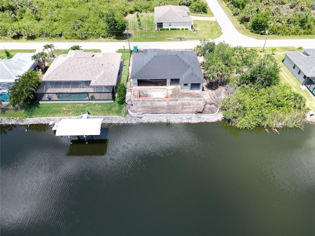bird's eye view of a nearby body of water and a forest