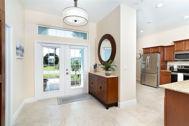 8952 Scallop Way, Placida, FL 33946 - entrance foyer featuring french doors, baseboards, and recessed lighting