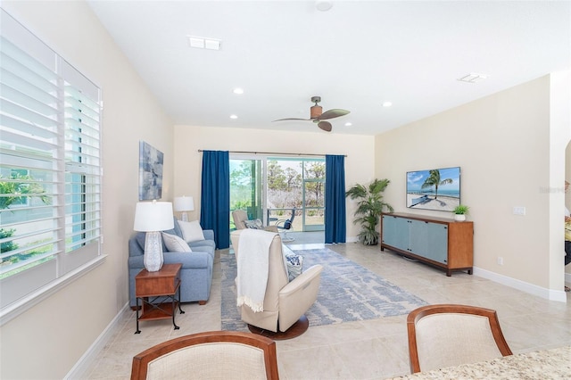 8952 Scallop Way, Placida, FL 33946 - living room featuring tile patterned floors, ceiling fan, baseboards, and recessed lighting