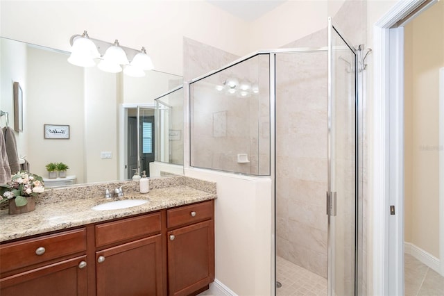 8952 Scallop Way, Placida, FL 33946 - full bath with a shower stall, vanity, toilet, and tile patterned flooring