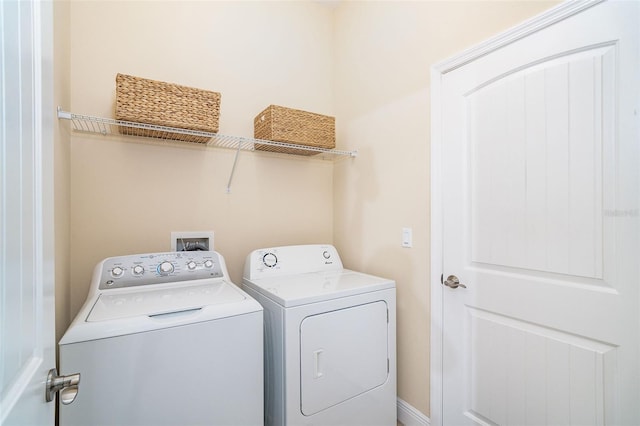 8952 Scallop Way, Placida, FL 33946 - laundry room featuring washing machine and dryer