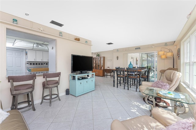 146 Rotonda Cir, Rotonda West, FL 33947 - living area featuring light tile patterned flooring