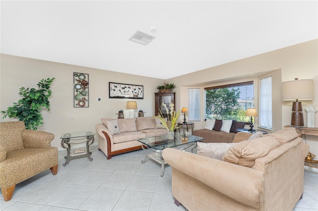 146 Rotonda Cir, Rotonda West, FL 33947 - living area featuring light tile patterned floors