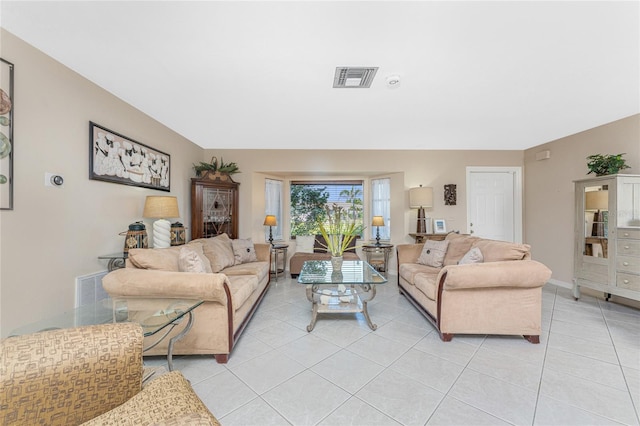 146 Rotonda Cir, Rotonda West, FL 33947 - living room featuring light tile patterned floors