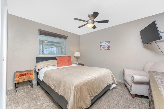 146 Rotonda Cir, Rotonda West, FL 33947 - bedroom with light colored carpet, baseboards, and ceiling fan
