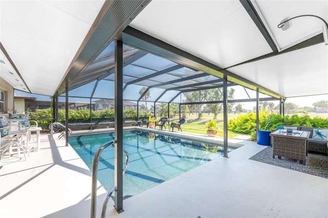 146 Rotonda Cir, Rotonda West, FL 33947 - outdoor pool featuring a patio area, an outdoor hangout area, and glass enclosure