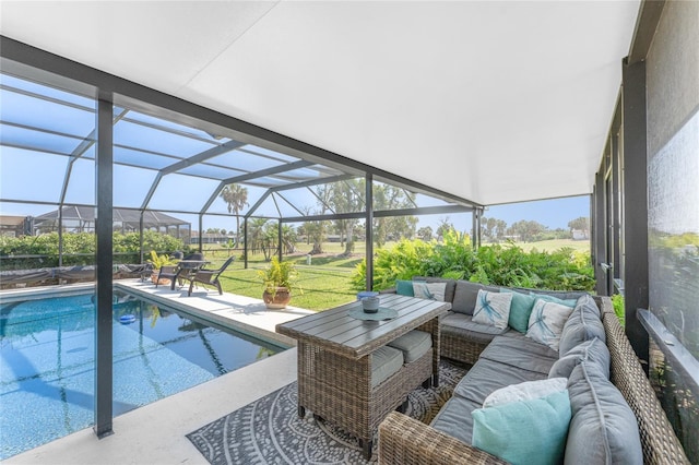 146 Rotonda Cir, Rotonda West, FL 33947 - outdoor pool featuring an outdoor hangout area, a patio, glass enclosure, and a lawn