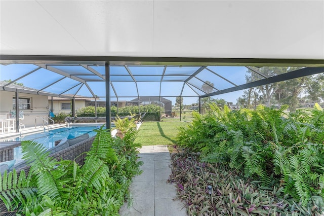 146 Rotonda Cir, Rotonda West, FL 33947 - swimming pool with a lawn, a patio area, and a lanai
