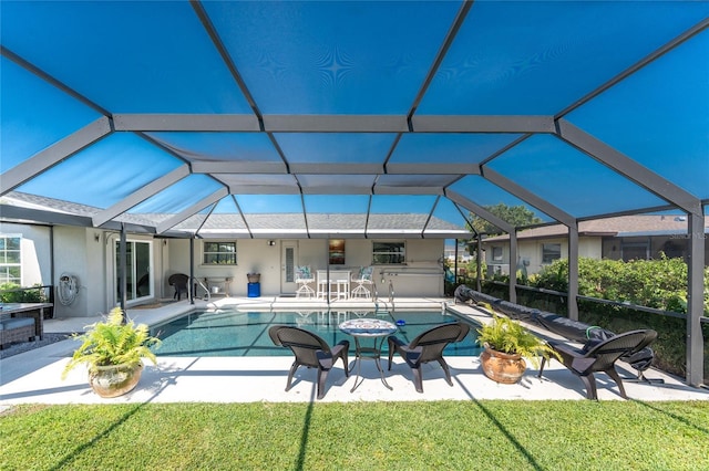 146 Rotonda Cir, Rotonda West, FL 33947 - swimming pool featuring a patio and glass enclosure