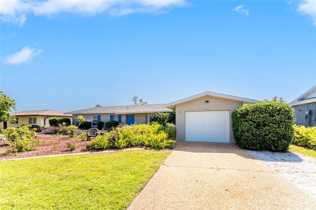 146 Rotonda Cir, Rotonda West, FL 33947 - ranch-style home featuring stucco siding, concrete driveway, an attached garage, and a front yard