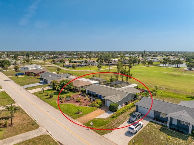 146 Rotonda Cir, Rotonda West, FL 33947 - aerial perspective of suburban area featuring a nearby body of water