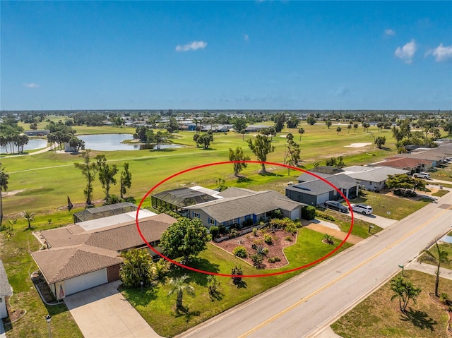 146 Rotonda Cir, Rotonda West, FL 33947 - aerial view of residential area with a large body of water and a golf club