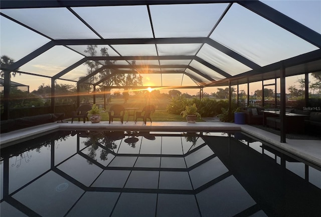 146 Rotonda Cir, Rotonda West, FL 33947 - outdoor pool featuring a patio area and glass enclosure