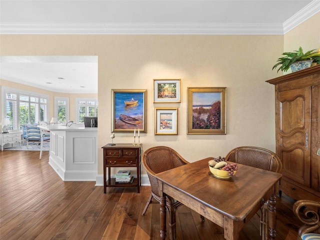 2979 Shore Ln, Boca Grande, FL 33921 - dining space featuring dark wood-style flooring, crown molding, and baseboards