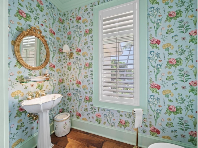 2979 Shore Ln, Boca Grande, FL 33921 - bathroom with wallpapered walls, baseboards, and wood finished floors