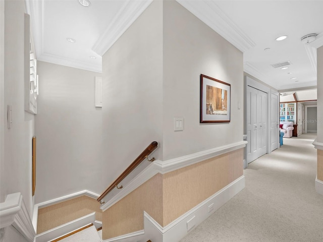 2979 Shore Ln, Boca Grande, FL 33921 - corridor featuring crown molding, an upstairs landing, recessed lighting, light colored carpet, and baseboards