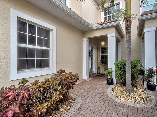2590 Tarpon Cove Dr Unit 811, Punta Gorda, FL 33950 - doorway to property with stucco siding