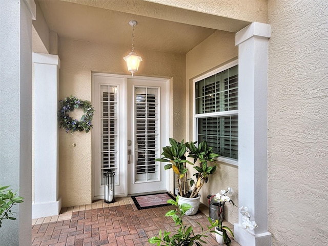 2590 Tarpon Cove Dr Unit 811, Punta Gorda, FL 33950 - view of exterior entry with stucco siding