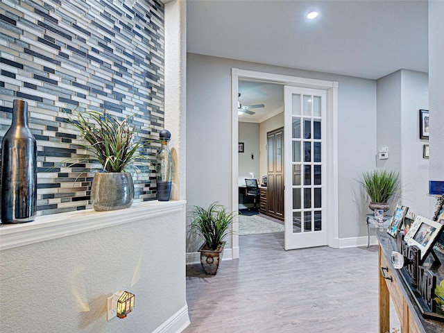 2590 Tarpon Cove Dr Unit 811, Punta Gorda, FL 33950 - hall with baseboards, wood finished floors, french doors, recessed lighting, and ornamental molding