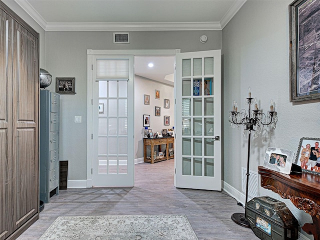 2590 Tarpon Cove Dr Unit 811, Punta Gorda, FL 33950 - entryway featuring french doors, wood finished floors, baseboards, and ornamental molding