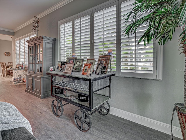 2590 Tarpon Cove Dr Unit 811, Punta Gorda, FL 33950 - detailed view of wood finished floors, baseboards, and crown molding