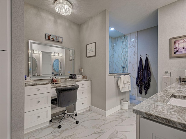 2590 Tarpon Cove Dr Unit 811, Punta Gorda, FL 33950 - full bath featuring vanity, marble look tile flooring, a textured wall, baseboards, and a textured ceiling