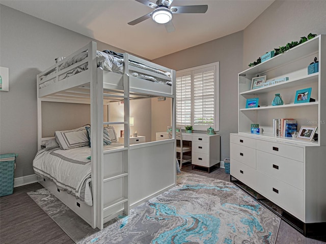 2590 Tarpon Cove Dr Unit 811, Punta Gorda, FL 33950 - bedroom with wood finished floors, baseboards, a ceiling fan, and an office area