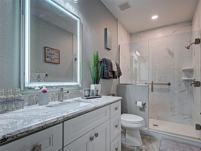 2590 Tarpon Cove Dr Unit 811, Punta Gorda, FL 33950 - full bathroom featuring a textured wall, a marble finish shower, toilet, vanity, and recessed lighting