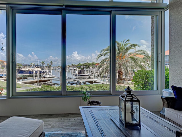 2590 Tarpon Cove Dr Unit 811, Punta Gorda, FL 33950 - sitting room featuring plenty of natural light and wood finished floors