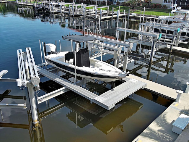 2590 Tarpon Cove Dr Unit 811, Punta Gorda, FL 33950 - dock with boat lift and a water view
