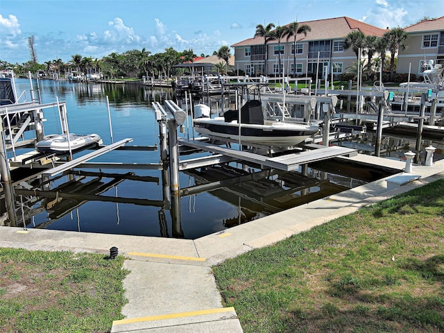 2590 Tarpon Cove Dr Unit 811, Punta Gorda, FL 33950 - dock with boat lift and a water view