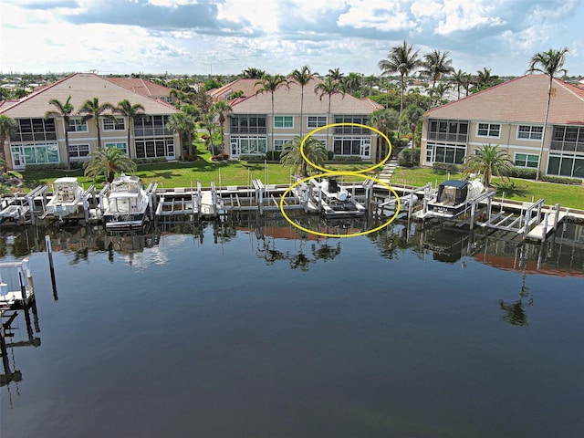 2590 Tarpon Cove Dr Unit 811, Punta Gorda, FL 33950 - water view with boat lift and a dock