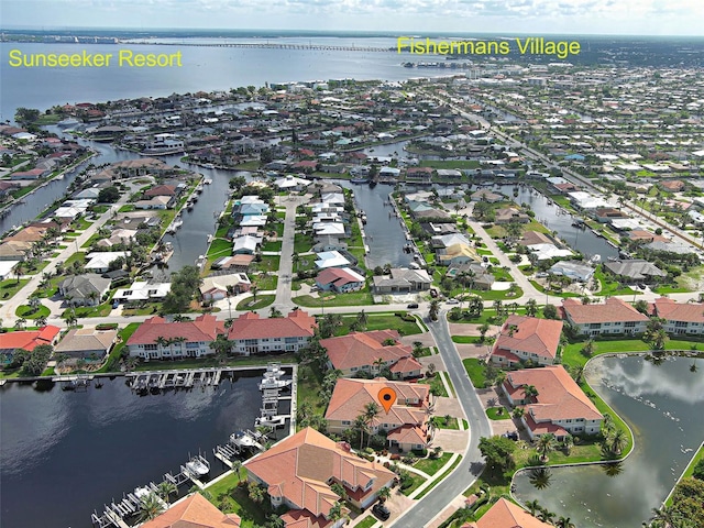 2590 Tarpon Cove Dr Unit 811, Punta Gorda, FL 33950 - aerial overview of property's location with a large body of water and nearby suburban area