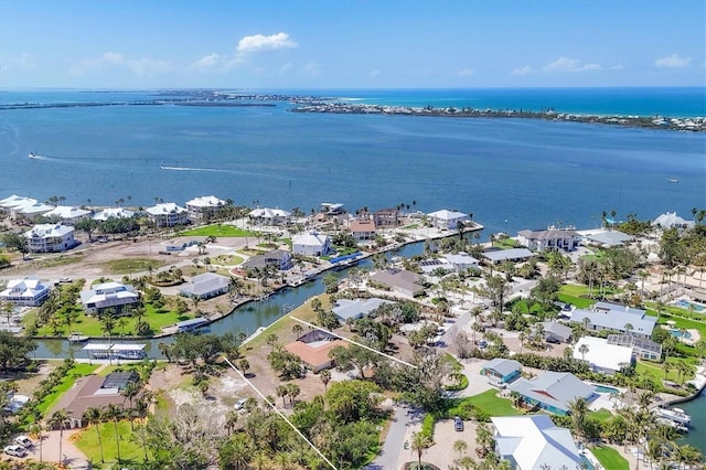 500 Green Dolphin Dr S, Placida, FL 33946 - aerial perspective of suburban area with a nearby body of water