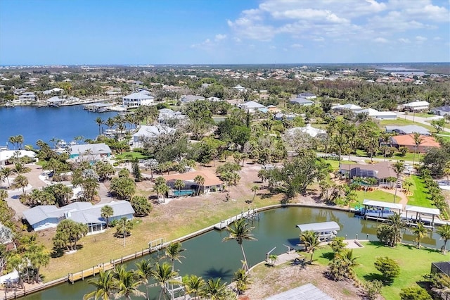 500 Green Dolphin Dr S, Placida, FL 33946 - aerial perspective of suburban area with a nearby body of water