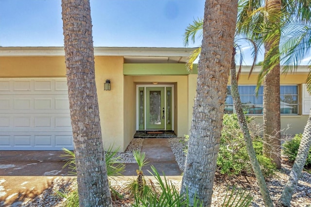 500 Green Dolphin Dr S, Placida, FL 33946 - doorway to property featuring stucco siding