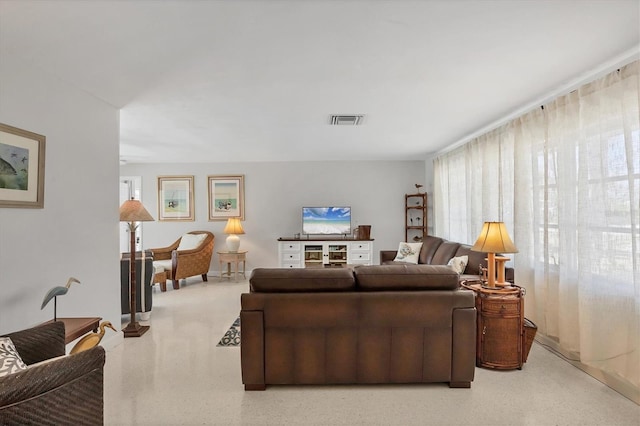 500 Green Dolphin Dr S, Placida, FL 33946 - living room with plenty of natural light and speckled floor