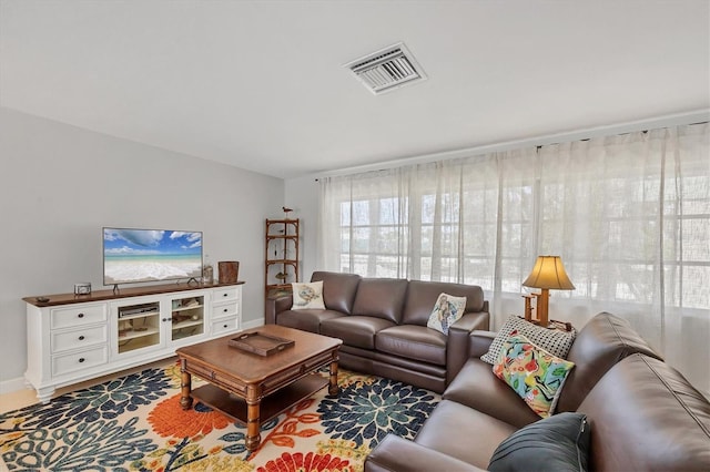 500 Green Dolphin Dr S, Placida, FL 33946 - living room featuring baseboards