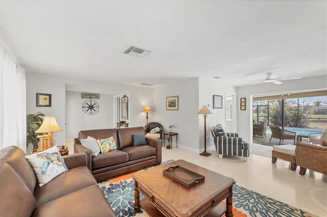 500 Green Dolphin Dr S, Placida, FL 33946 - living room with ceiling fan and baseboards
