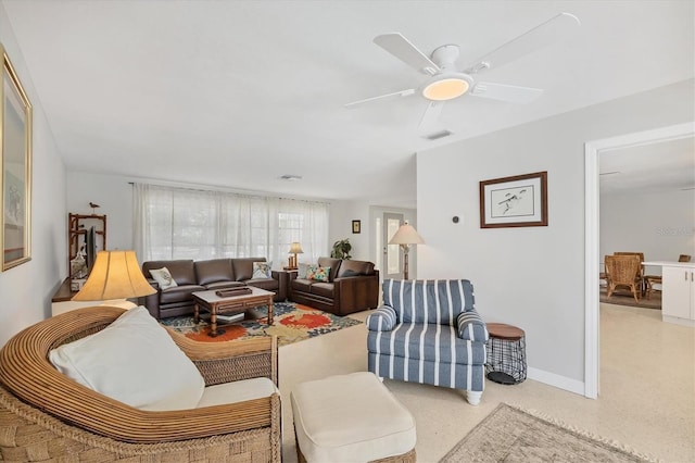 500 Green Dolphin Dr S, Placida, FL 33946 - living room featuring baseboards and ceiling fan