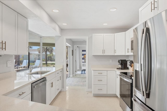 500 Green Dolphin Dr S, Placida, FL 33946 - kitchen featuring appliances with stainless steel finishes, white cabinets, and recessed lighting
