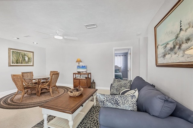 500 Green Dolphin Dr S, Placida, FL 33946 - living room with a ceiling fan and baseboards